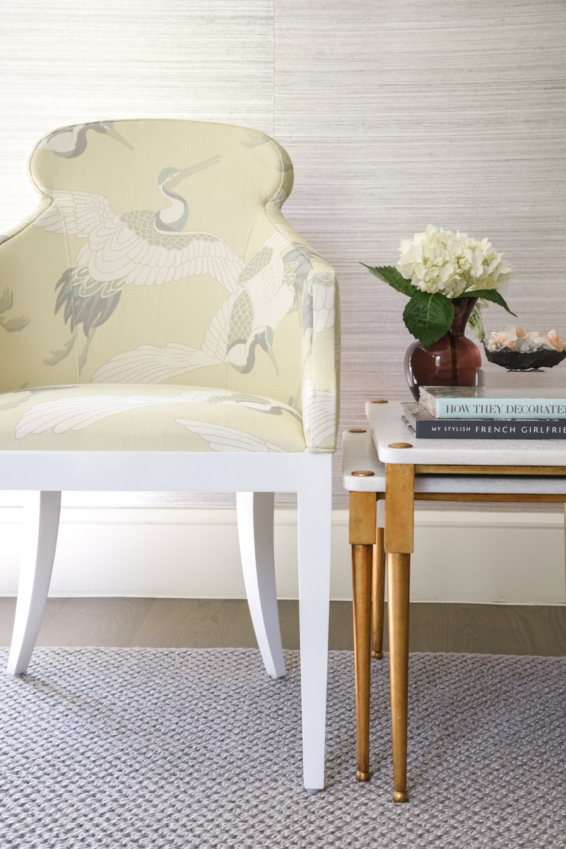 Vignette photo with printed chair and side tables