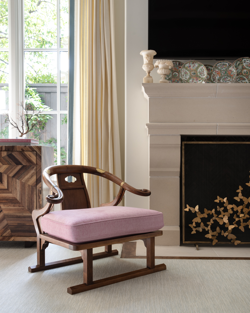 Vignette photo with fireplace and chair