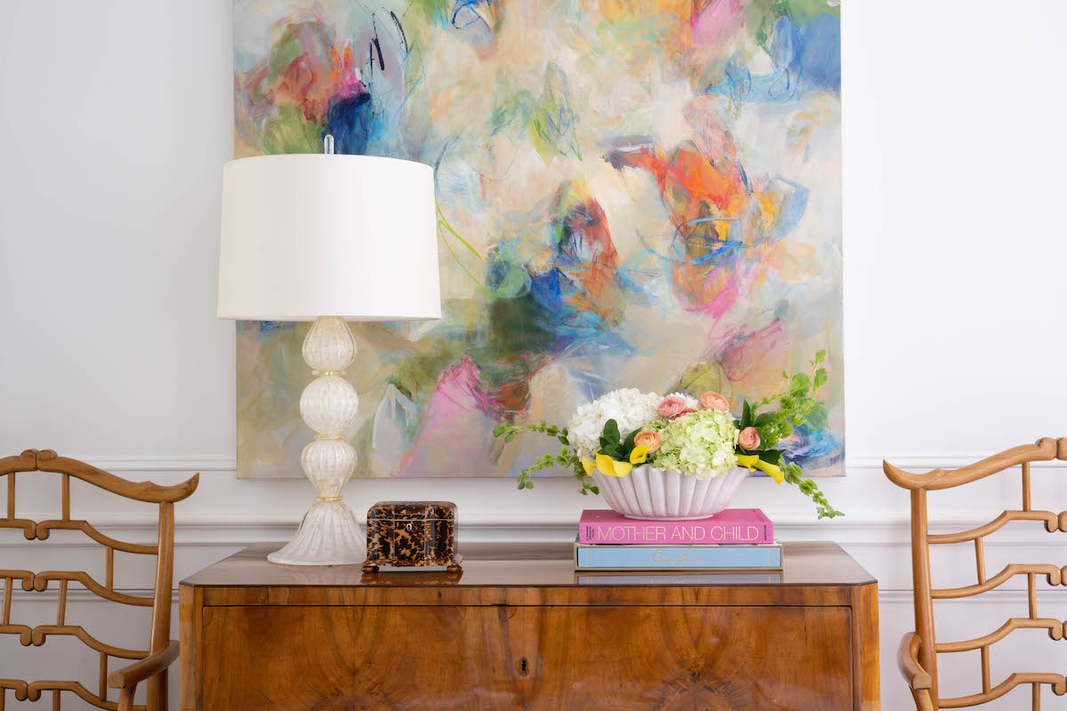 blue print interiors entryway with antique furniture and art