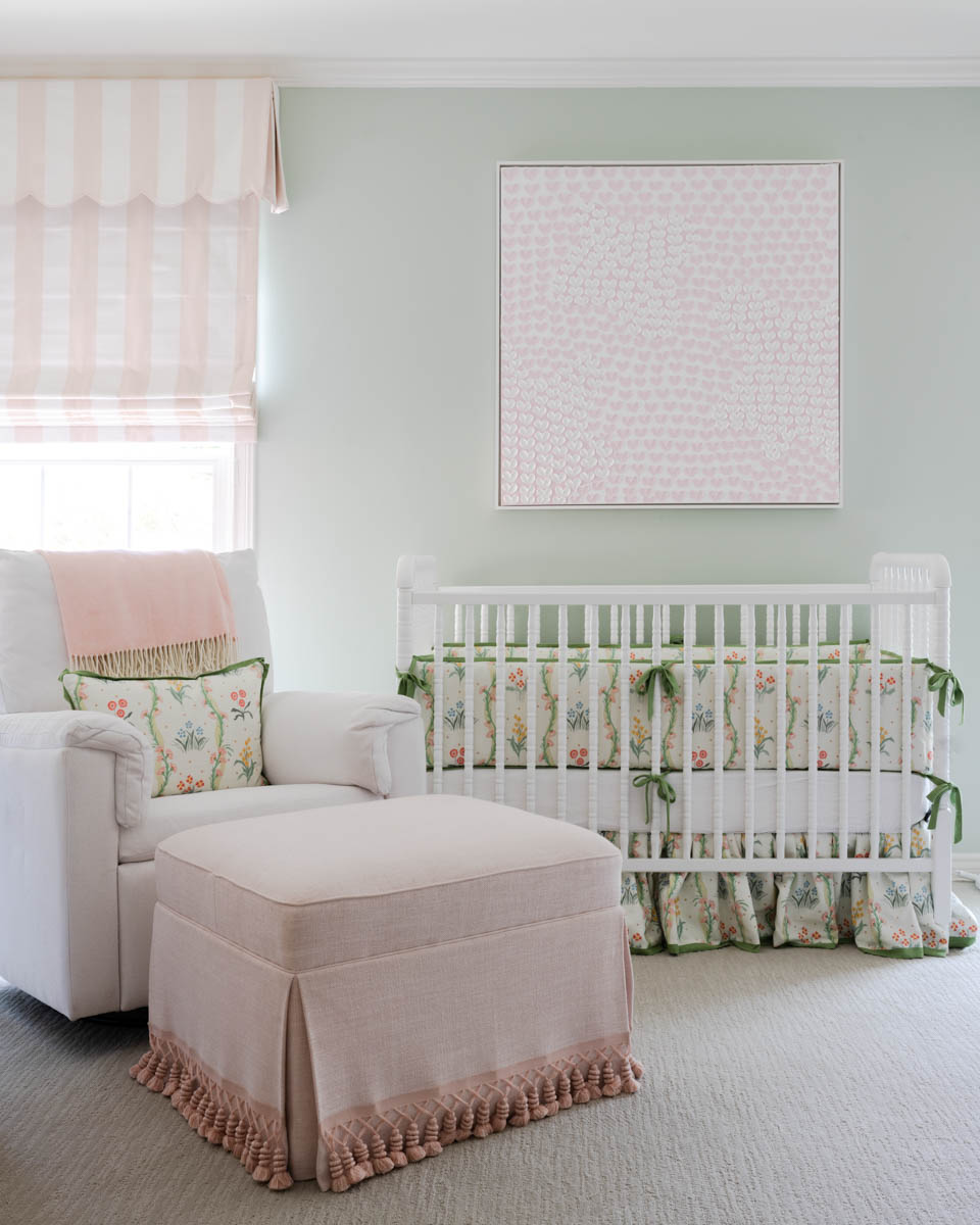 blue print interiors nursery with pink ottoman
